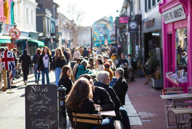 Image shows shoppers walking through the North Laine area of Brighton